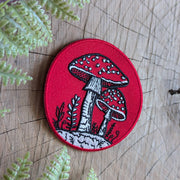 Iron-on patch | fly agaric mushroom - 2.5" round red - Art Department LLC