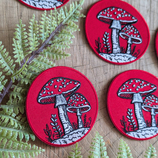 Iron-on patch | fly agaric mushroom - 2.5" round red - Art Department LLC