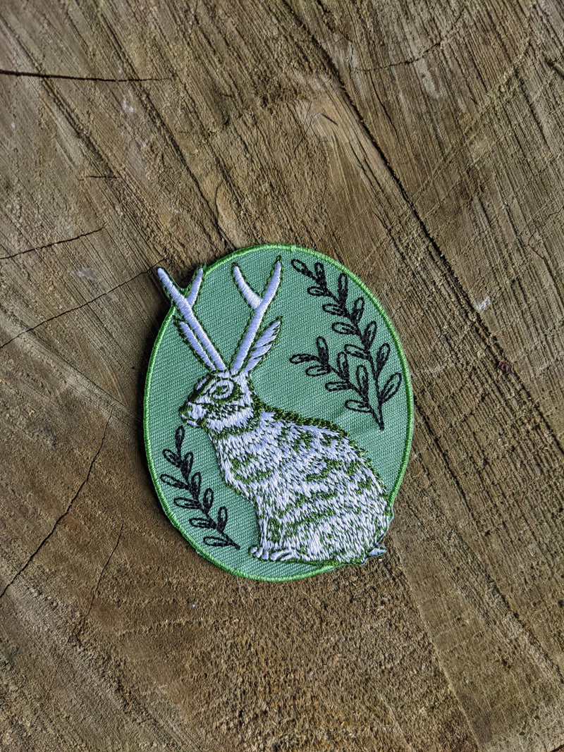 Iron-on patch | jackalope - green oval 2.5" x 3.2" - Art Department LLC