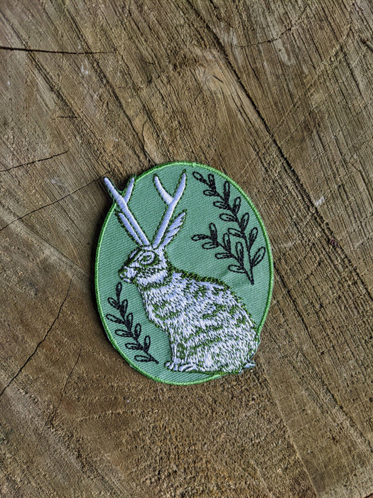 Iron-on patch | jackalope - green oval 2.5" x 3.2" - Art Department LLC