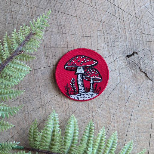 Iron-on patch | fly agaric mushroom - 2.5" round red - Art Department LLC