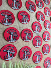 Iron-on patch | fly agaric mushroom - 2.5" round red - Art Department LLC