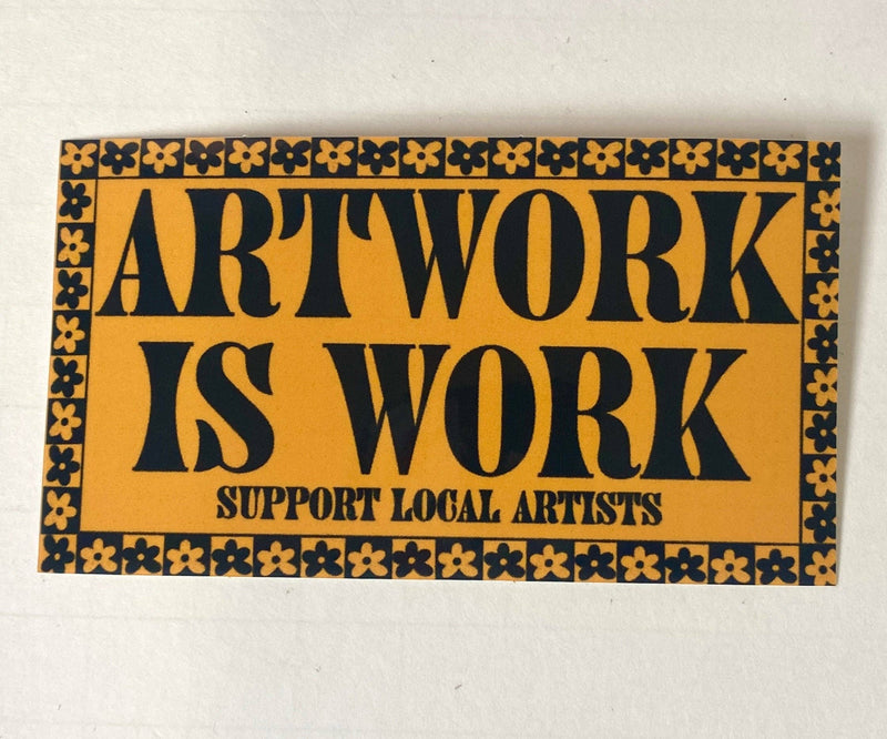 Artwork is Work Sticker, yellow background with black letters and black floral border.