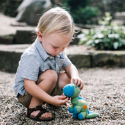 Handmade Stegosaurus Baby Rattle | Organic Cotton | Green - Art Department LLC