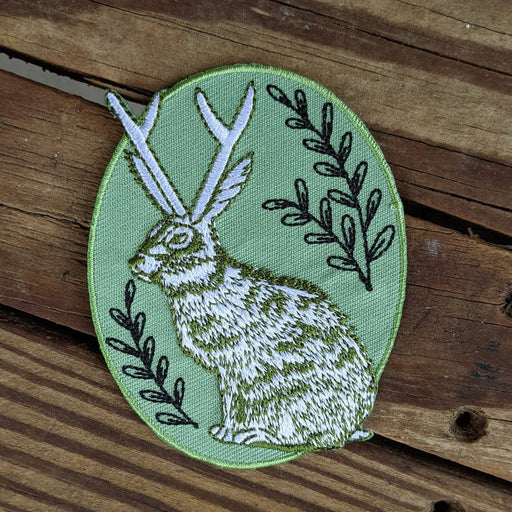 Iron-on patch | jackalope - green oval 2.5" x 3.2" - Art Department LLC
