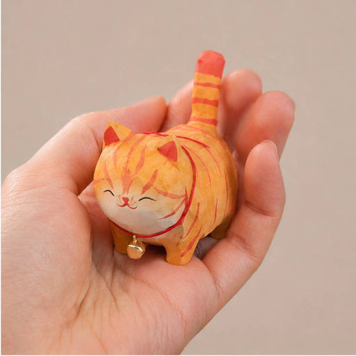 Hand-Carved Wooden Orange Cat Figurine with Bell - Art Department LLC